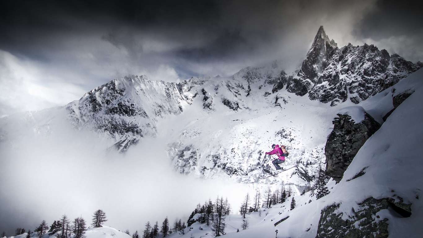 skiing_skier_jump_mountains_snow_108350_1366x768.jpg